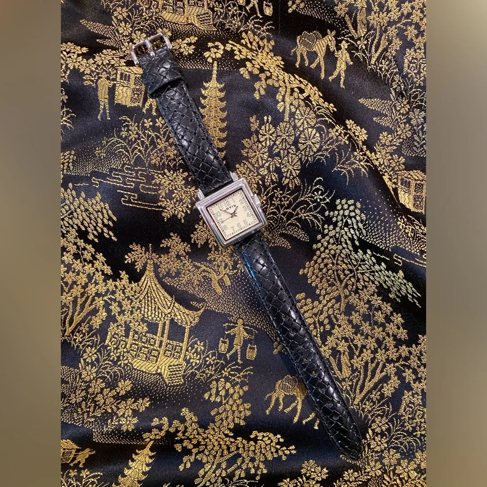 Orvis vintage women’s watch with black leather band